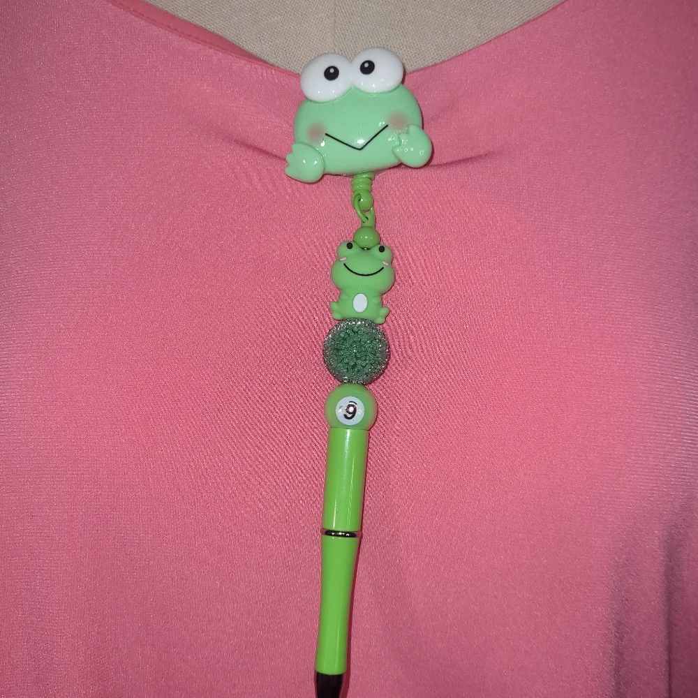 Green frog pen. Homemade and with a clip so you don't lose it.